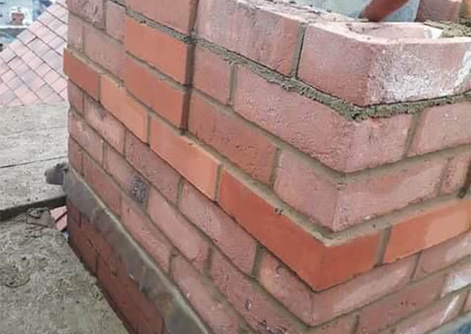 Chimney brickwork with lead tray